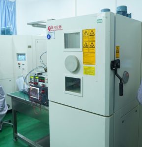 RF power amplifier undergoing temperature testing in an environmental chamber